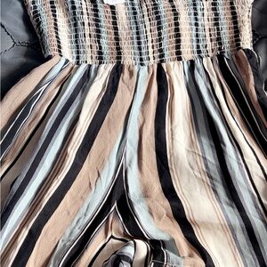Chic Striped Jumpsuit in Black, Blue, and Cream